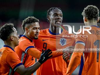 Netherlands player Devyne Rensch and Netherlands player Emmanuel Emegha participate in the match between Netherlands U21 and Sweden U21 at t...