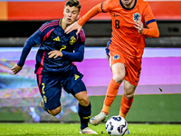 Sweden player Samuel Dahl and Netherlands player Kenneth Taylor participate in the match between Netherlands U21 and Sweden U21 at the Goffe...