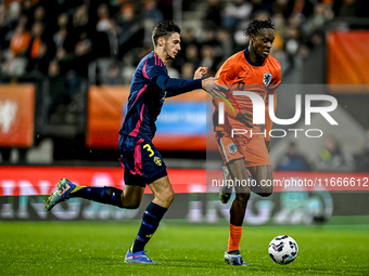 Sweden player Noah Eile and Netherlands player Emmanuel Emegha participate in the match between Netherlands U21 and Sweden U21 at the Goffer...