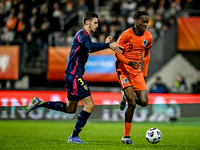 Sweden player Noah Eile and Netherlands player Emmanuel Emegha participate in the match between Netherlands U21 and Sweden U21 at the Goffer...