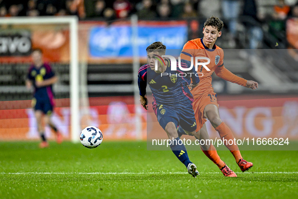 Sweden player Samuel Dahl and Netherlands player Ruben van Bommel participate in the match between Netherlands U21 and Sweden U21 at the Gof...