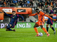 Sweden player Matteo Perez Vinlof and Netherlands player Noah Ohio participate in the match between Netherlands U21 and Sweden U21 at the Go...