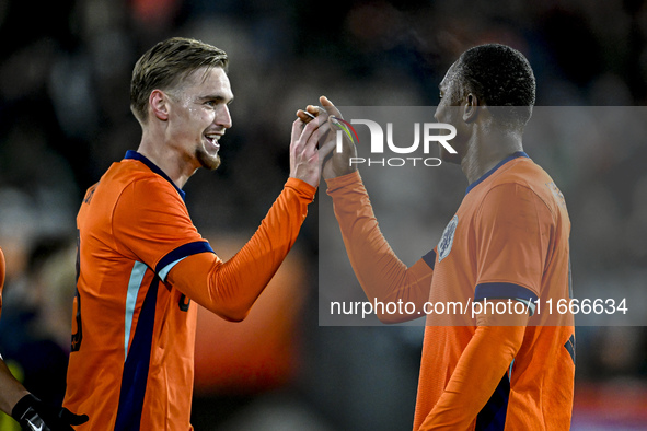 Netherlands player Kenneth Taylor and Netherlands player Neraysho Kasanwirjo celebrate a goal during the match between Netherlands U21 and S...