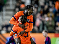 Netherlands players Rav van den Berg and Emmanuel Emegha celebrate the 2-0 goal during the Netherlands U21 vs. Sweden U21 match at the Goffe...