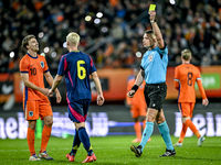 Referee Robert Jones shows a yellow card to Netherlands player Youri Regeer during the match between Netherlands U21 and Sweden U21 at the G...