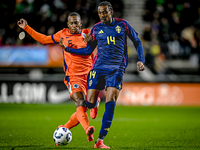 Netherlands player Ryan Flamingo and Sweden player Amar Fatah participate in the match between Netherlands U21 and Sweden U21 at the Goffert...