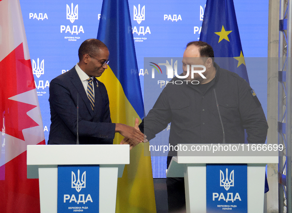 Ruslan Stefanchuk, Speaker of the Verkhovna Rada of Ukraine, shakes hands with Greg Fergus, Speaker of the House of Commons of the Parliamen...