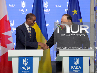 Ruslan Stefanchuk, Speaker of the Verkhovna Rada of Ukraine, shakes hands with Greg Fergus, Speaker of the House of Commons of the Parliamen...