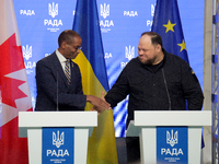 Ruslan Stefanchuk, Speaker of the Verkhovna Rada of Ukraine, shakes hands with Greg Fergus, Speaker of the House of Commons of the Parliamen...