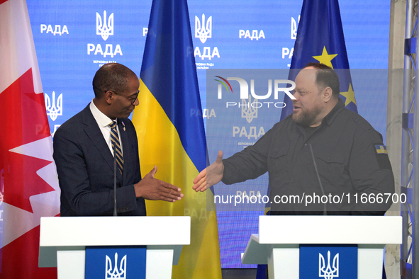 Ruslan Stefanchuk, Speaker of the Verkhovna Rada of Ukraine, shakes hands with Greg Fergus, Speaker of the House of Commons of the Parliamen...