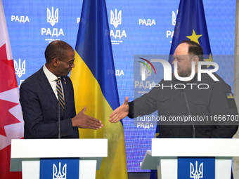 Ruslan Stefanchuk, Speaker of the Verkhovna Rada of Ukraine, shakes hands with Greg Fergus, Speaker of the House of Commons of the Parliamen...