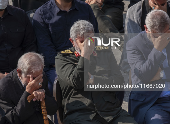 Brigadier General Esmail Qaani, Commander of the Quds Force of the Islamic Revolutionary Guard Corps, mourns while attending a funeral cerem...