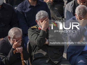 Brigadier General Esmail Qaani, Commander of the Quds Force of the Islamic Revolutionary Guard Corps, mourns while attending a funeral cerem...