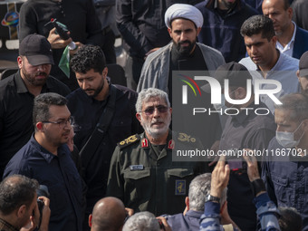 Brigadier General Esmail Qaani, Commander of the Quds Force of the Islamic Revolutionary Guard Corps, looks on after attending a funeral cer...