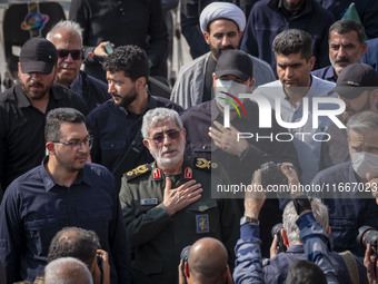 Brigadier General Esmail Qaani, Commander of the Quds Force of the Islamic Revolutionary Guard Corps, gestures after attending a funeral cer...