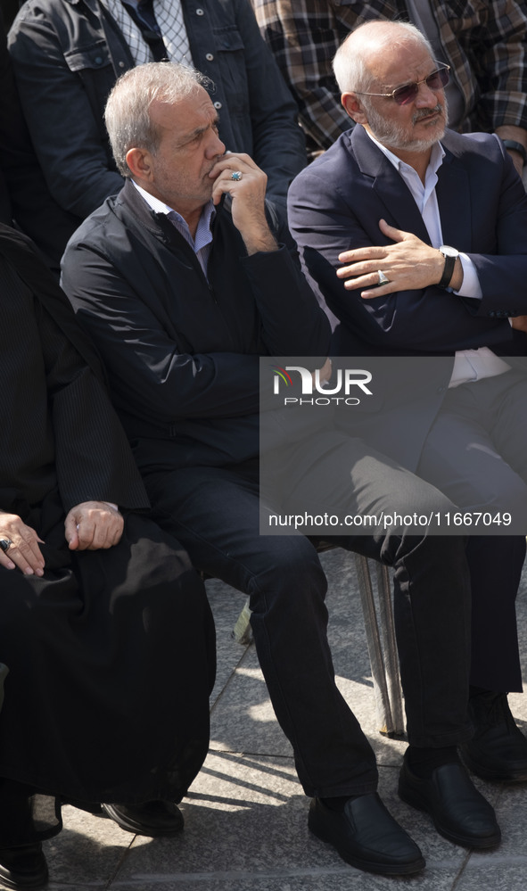 Iranian President Masoud Pezeshkian attends a funeral ceremony for General Abbas Nilforoushan, a commander of the IRGC's Quds Force, who is...