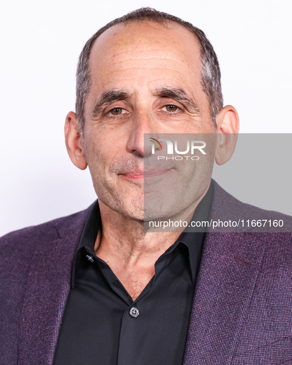 Peter Jacobson arrives at the Global Premiere Of Paramount Pictures' 'Smile 2' held at Paramount Pictures Studios on October 14, 2024 in Hol...