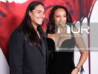 Ivan Carlo and Erica Sanders arrive at the Global Premiere Of Paramount Pictures' 'Smile 2' held at Paramount Pictures Studios on October 14...