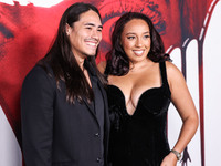 Ivan Carlo and Erica Sanders arrive at the Global Premiere Of Paramount Pictures' 'Smile 2' held at Paramount Pictures Studios on October 14...