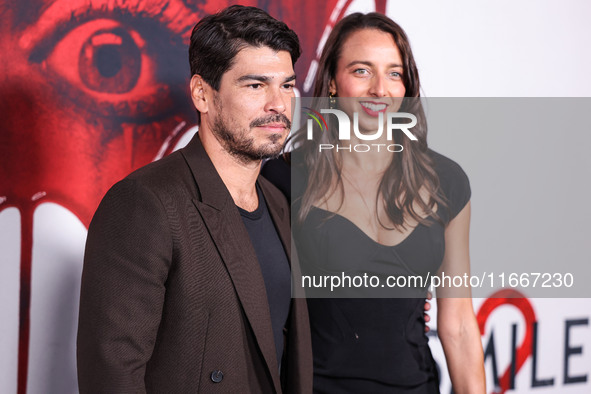 Raul Castillo and Alexis Forte arrive at the Global Premiere Of Paramount Pictures' 'Smile 2' held at Paramount Pictures Studios on October...