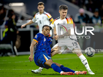 Netherlands midfielder Ryan Gravenberch and Germany midfielder Angelo Stiller play during the match between Germany and the Netherlands at t...