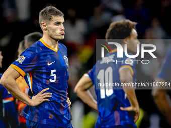 Netherlands defender Mickey van de Ven appears dejected after the lost game during the match between Germany and the Netherlands at the Alli...