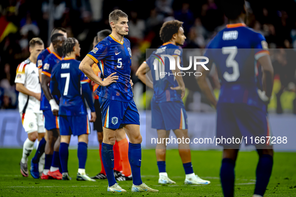 Netherlands defender Mickey van de Ven appears dejected after the lost game during the match between Germany and the Netherlands at the Alli...