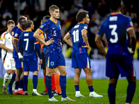 Netherlands defender Mickey van de Ven appears dejected after the lost game during the match between Germany and the Netherlands at the Alli...