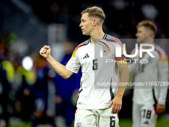 Germany defender Joshua Kimmich celebrates the victory after the game during the match between Germany and the Netherlands at the Allianz Ar...