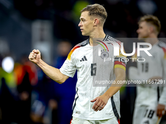 Germany defender Joshua Kimmich celebrates the victory after the game during the match between Germany and the Netherlands at the Allianz Ar...