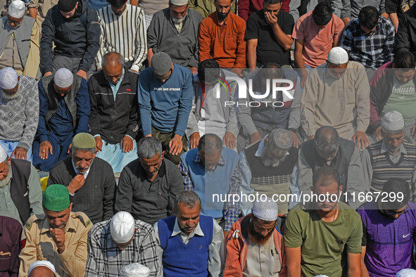 People offer congregational prayers during the annual festival of Saint Sheikh Abdul Qadir Jeelani (RA) in Srinagar, Kashmir, on October 15,...