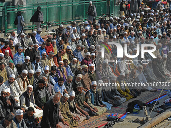 People offer congregational prayers during the annual festival of Saint Sheikh Abdul Qadir Jeelani (RA) in Srinagar, Kashmir, on October 15,...