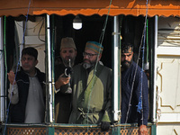 The head cleric displays the holy relic during the festival of Saint Sheikh Abdul Qadir Jeelani (RA) in Srinagar, Kashmir, on October 15, 20...