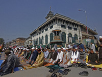 People offer congregational prayers during the annual festival of Saint Sheikh Abdul Qadir Jeelani (RA) in Srinagar, Kashmir, on October 15,...