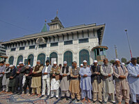 People offer congregational prayers during the annual festival of Saint Sheikh Abdul Qadir Jeelani (RA) in Srinagar, Kashmir, on October 15,...