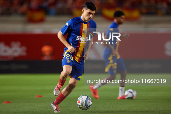 Pedri of Spain is in action before the UEFA Nations League 2024/25 League A Group A4 game between Spain and Denmark at Enrique Roca Stadium...