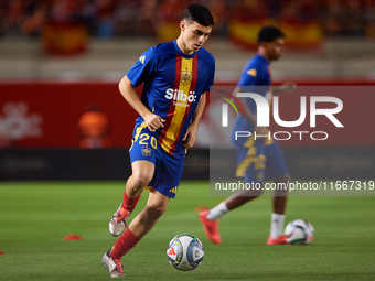 Pedri of Spain is in action before the UEFA Nations League 2024/25 League A Group A4 game between Spain and Denmark at Enrique Roca Stadium...