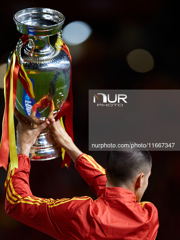 Alvaro Morata of Spain shows the UEFA EURO trophy to the crowd prior to the UEFA Nations League 2024/25 League A Group A4 game between Spain...