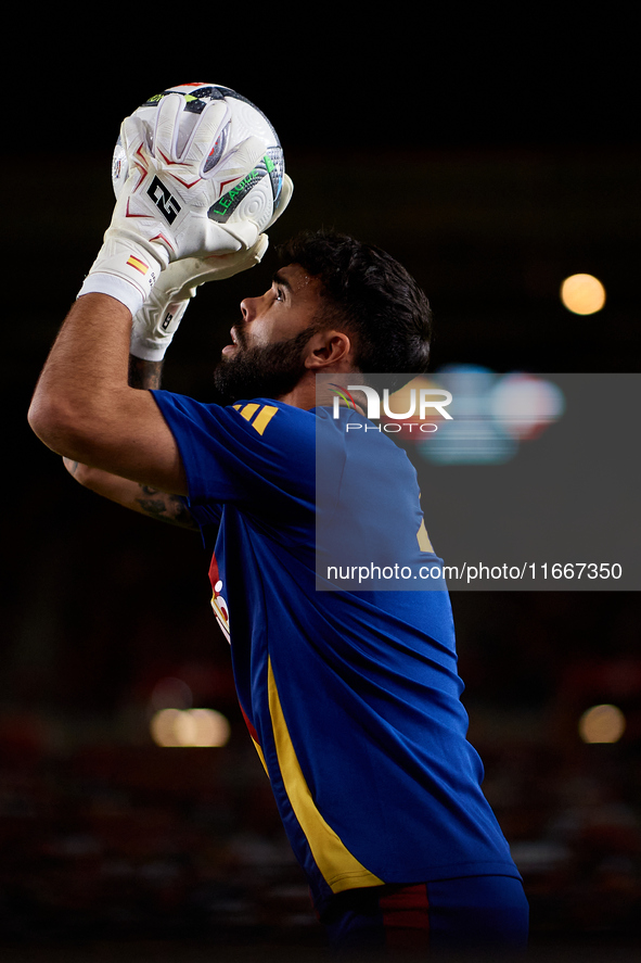 David Raya of Spain is in action prior to the UEFA Nations League 2024/25 League A Group A4 game between Spain and Denmark at Enrique Roca s...