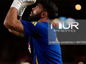 David Raya of Spain is in action prior to the UEFA Nations League 2024/25 League A Group A4 game between Spain and Denmark at Enrique Roca s...