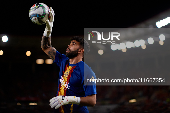 David Raya of Spain is in action prior to the UEFA Nations League 2024/25 League A Group A4 game between Spain and Denmark at Enrique Roca s...