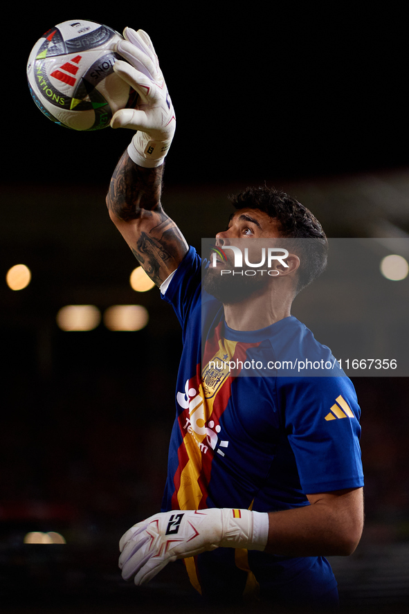 David Raya of Spain is in action prior to the UEFA Nations League 2024/25 League A Group A4 game between Spain and Denmark at Enrique Roca s...