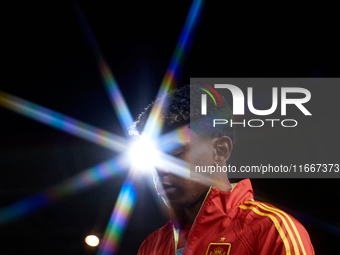 Lamine Yamal of Spain looks on before the UEFA Nations League 2024/25 League A Group A4 game between Spain and Denmark at Enrique Roca Stadi...