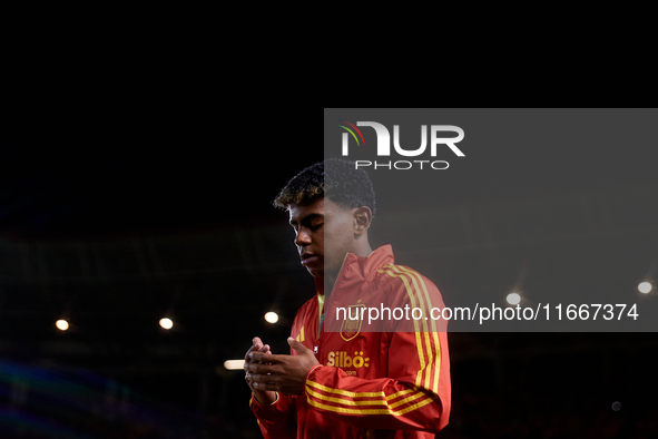 Lamine Yamal of Spain looks on before the UEFA Nations League 2024/25 League A Group A4 game between Spain and Denmark at Enrique Roca stadi...