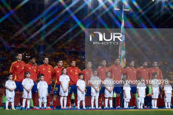 Spain players line up before the UEFA Nations League 2024/25 League A Group A4 game between Spain and Denmark at Enrique Roca Stadium in Mur...