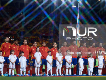 Spain players line up before the UEFA Nations League 2024/25 League A Group A4 game between Spain and Denmark at Enrique Roca Stadium in Mur...