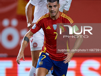 Alvaro Morata of Spain competes for the ball with Vestergaard of Denmark during the UEFA Nations League 2024/25 League A Group A4 game betwe...