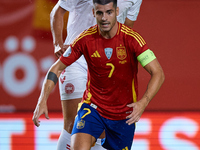 Alvaro Morata of Spain competes for the ball with Vestergaard of Denmark during the UEFA Nations League 2024/25 League A Group A4 game betwe...