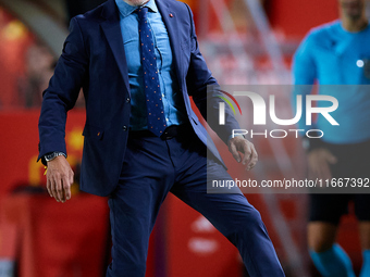 Luis de la Fuente, head coach of Spain, stops the ball during the UEFA Nations League 2024/25 League A Group A4 game between Spain and Denma...