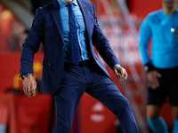 Luis de la Fuente, head coach of Spain, stops the ball during the UEFA Nations League 2024/25 League A Group A4 game between Spain and Denma...